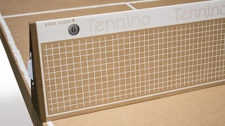 Illustration for article titled Cardboard Table Tennis Folds Down Into a Portable Cardboard Suitcase